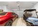Two-car garage with space for golf cart and additional storage at 9002 Sw 75Th Loop, Ocala, FL 34481