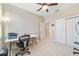 Home office featuring a work desk, chair, and ample space for a home office setup at 9002 Sw 75Th Loop, Ocala, FL 34481