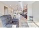 Open kitchen with dark cabinets and granite counters at 9002 Sw 75Th Loop, Ocala, FL 34481