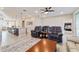 Open concept living room, dining and kitchen area with comfortable seating and lots of natural light at 9002 Sw 75Th Loop, Ocala, FL 34481