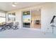 Screened porch with sliding glass doors leading to the interior at 9002 Sw 75Th Loop, Ocala, FL 34481