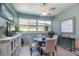Casual dining area with round table and four chairs at 9257 Sw 94Th Loop, Ocala, FL 34481