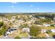 Aerial view showcasing the home's location in a residential neighborhood at 10195 Se 178Th Pl, Summerfield, FL 34491