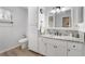 Clean bathroom with a single vanity, updated fixtures, and a toilet at 10195 Se 178Th Pl, Summerfield, FL 34491