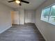 Spacious bedroom with gray vinyl flooring and ceiling fan at 11179 Sw 78Th Ct, Ocala, FL 34476