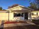 Front view of a newly renovated house with a covered porch at 11179 Sw 78Th Ct, Ocala, FL 34476