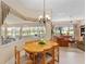 Dining area with a wooden table and chairs, featuring a view at 13195 Se 93Rd Cir, Summerfield, FL 34491