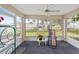 Relaxing sunroom with ample natural light and a view of the backyard at 1943 Nw 50Th Cir, Ocala, FL 34482