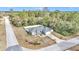 Aerial view of a single-story home with a fenced yard and driveway at 1995 Sw 160Th Pl, Ocala, FL 34473