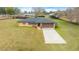 Single-story home with driveway and spacious yard at 2201 Nw 135Th Ln, Citra, FL 32113