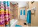 Bathroom with shower/tub and patterned shower curtain at 2201 Nw 135Th Ln, Citra, FL 32113