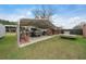 Covered carport for vehicle storage and maintenance at 2201 Nw 135Th Ln, Citra, FL 32113