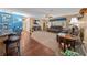 Living room with fireplace and access to kitchen at 2201 Nw 135Th Ln, Citra, FL 32113