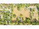 Aerial view of property showing surrounding houses and large lot at 2751 Ne 46Th St, Ocala, FL 34479