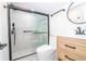 Modern bathroom with a frameless glass shower and sleek fixtures at 2751 Ne 46Th St, Ocala, FL 34479