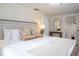 Spacious bedroom with a rustic wood headboard and soft textiles at 2751 Ne 46Th St, Ocala, FL 34479
