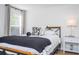 Cozy bedroom with a plush blanket and a bedside table at 2751 Ne 46Th St, Ocala, FL 34479
