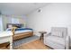 Bedroom with a queen bed and sitting area at 2751 Ne 46Th St, Ocala, FL 34479