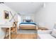 Charming bedroom featuring a wood bed frame and a sitting area at 2751 Ne 46Th St, Ocala, FL 34479