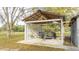 Covered storage area with a trailer parked inside at 2751 Ne 46Th St, Ocala, FL 34479