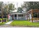 Newly renovated home with a large yard and patio at 2751 Ne 46Th St, Ocala, FL 34479