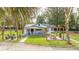 Aerial view of the house, yard, and surrounding trees at 2751 Ne 46Th St, Ocala, FL 34479