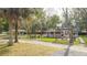 House exterior showcasing front porch, landscaping, and driveway at 2751 Ne 46Th St, Ocala, FL 34479
