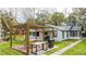 Backyard view of the home with pergola, picnic table and grill at 2751 Ne 46Th St, Ocala, FL 34479
