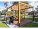 Outdoor brick patio with pergola at 2751 Ne 46Th St, Ocala, FL 34479