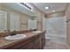 Bathroom with double vanity, bathtub and shower at 5230 Nw 56Th Ter, Ocala, FL 34482