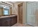 Double vanity bathroom with shower and linen closet at 5230 Nw 56Th Ter, Ocala, FL 34482
