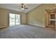 Spacious living area with sliding glass doors leading to the backyard at 5230 Nw 56Th Ter, Ocala, FL 34482