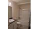 Clean bathroom with tub/shower combo, vanity, and tile floors at 5489 Nw 12Th. St, Ocala, FL 34482