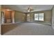 Spacious living room with neutral colored walls and carpeted floors at 5833 Nw 65Th St, Ocala, FL 34482