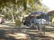 Large backyard with shed and screened patio at 611 Sw Shorewood Dr, Dunnellon, FL 34431