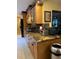 Kitchen with granite countertops and wood cabinets at 611 Sw Shorewood Dr, Dunnellon, FL 34431