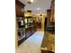 Kitchen with stainless steel appliances and granite countertops at 611 Sw Shorewood Dr, Dunnellon, FL 34431