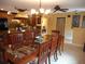 Open kitchen with granite countertops and a breakfast bar at 611 Sw Shorewood Dr, Dunnellon, FL 34431