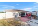 Backyard with patio, seating and fenced area at 7854 Sw 62Nd Ct, Ocala, FL 34476