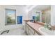 Clean bathroom with double vanity and separate shower at 7854 Sw 62Nd Ct, Ocala, FL 34476