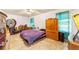 Main bedroom with tiled floors and lots of closet space at 7854 Sw 62Nd Ct, Ocala, FL 34476