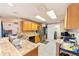 Bright kitchen featuring a large island and stainless steel appliances at 7854 Sw 62Nd Ct, Ocala, FL 34476