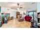 Living room with tiled floors, recliner, and large aquarium at 7854 Sw 62Nd Ct, Ocala, FL 34476