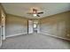 Spacious bedroom with carpet and ceiling fan at 8585 Sw 139Th Lane Rd, Ocala, FL 34473