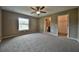 Large bedroom with ensuite bathroom and walk-in closet at 8585 Sw 139Th Lane Rd, Ocala, FL 34473
