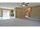 Open living room with views into dining area and kitchen at 8585 Sw 139Th Lane Rd, Ocala, FL 34473