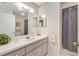 Clean bathroom with single sink vanity, shower, and toilet at 9862 Se 179Th Pl, Summerfield, FL 34491