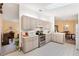Open concept kitchen with island and view into dining area at 9862 Se 179Th Pl, Summerfield, FL 34491
