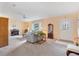 Living room featuring light walls, a comfortable sofa, and ample natural light at 9862 Se 179Th Pl, Summerfield, FL 34491