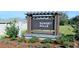 Sunset Hills community entrance sign with landscaping at 10013 Se 161St Lane Rd, Summerfield, FL 34491